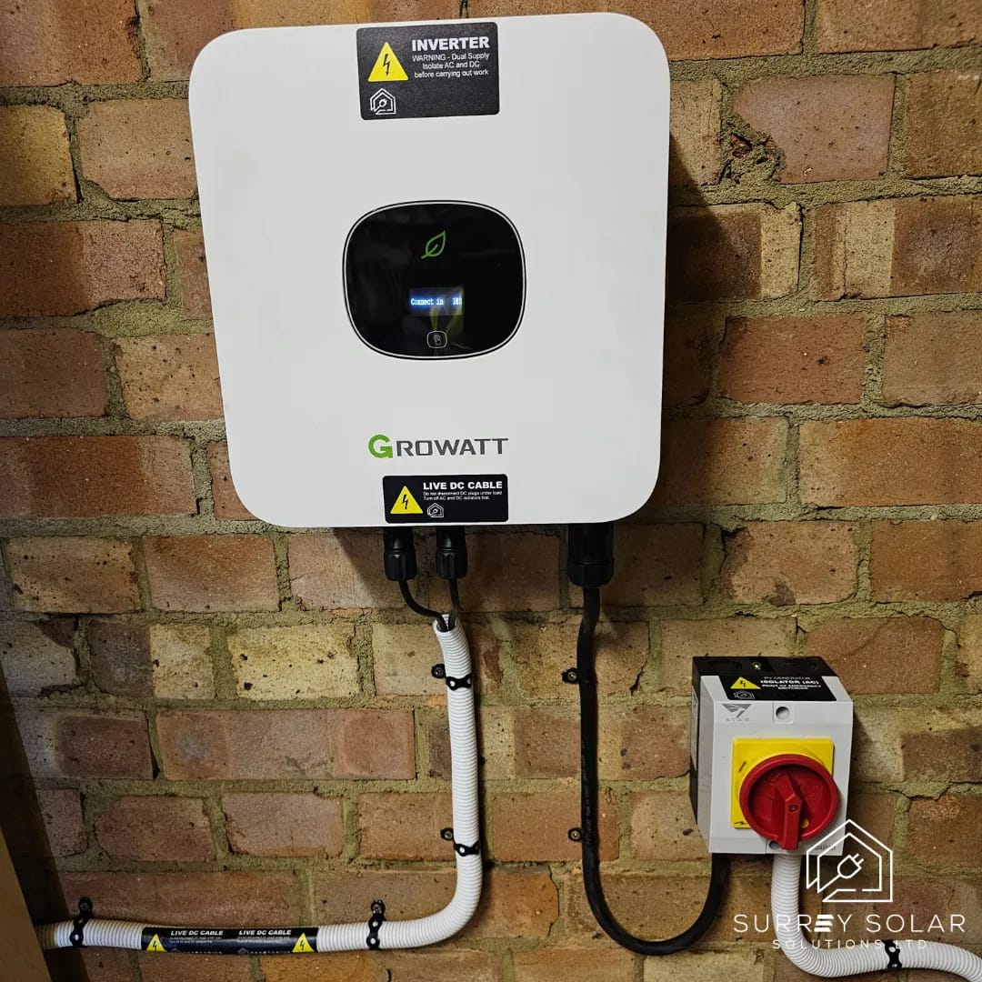 Wall-mounted solar inverter installed by Grand Innovations