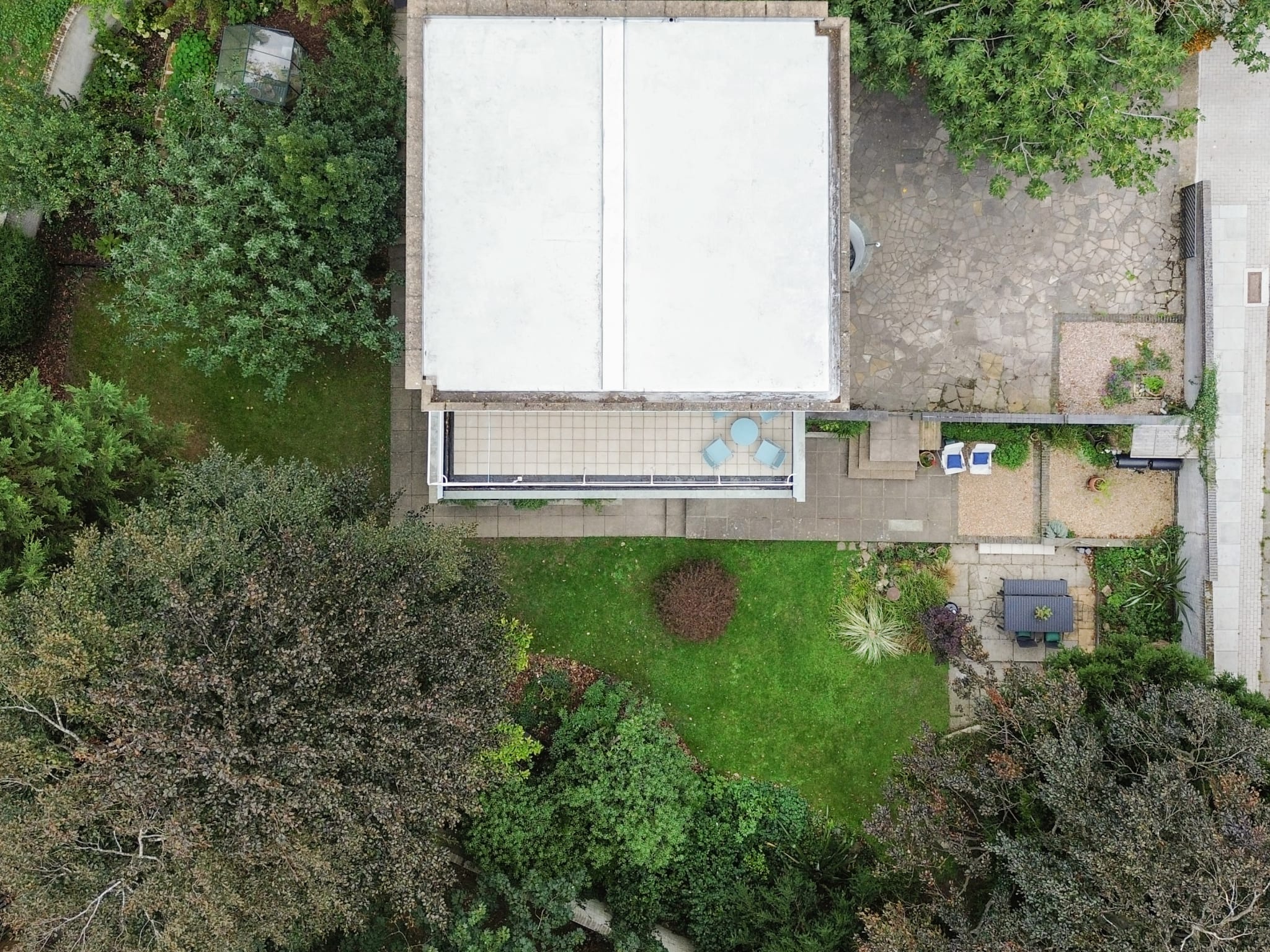 Aerial view of a flat-roof building project by Grand Innovations, Putney