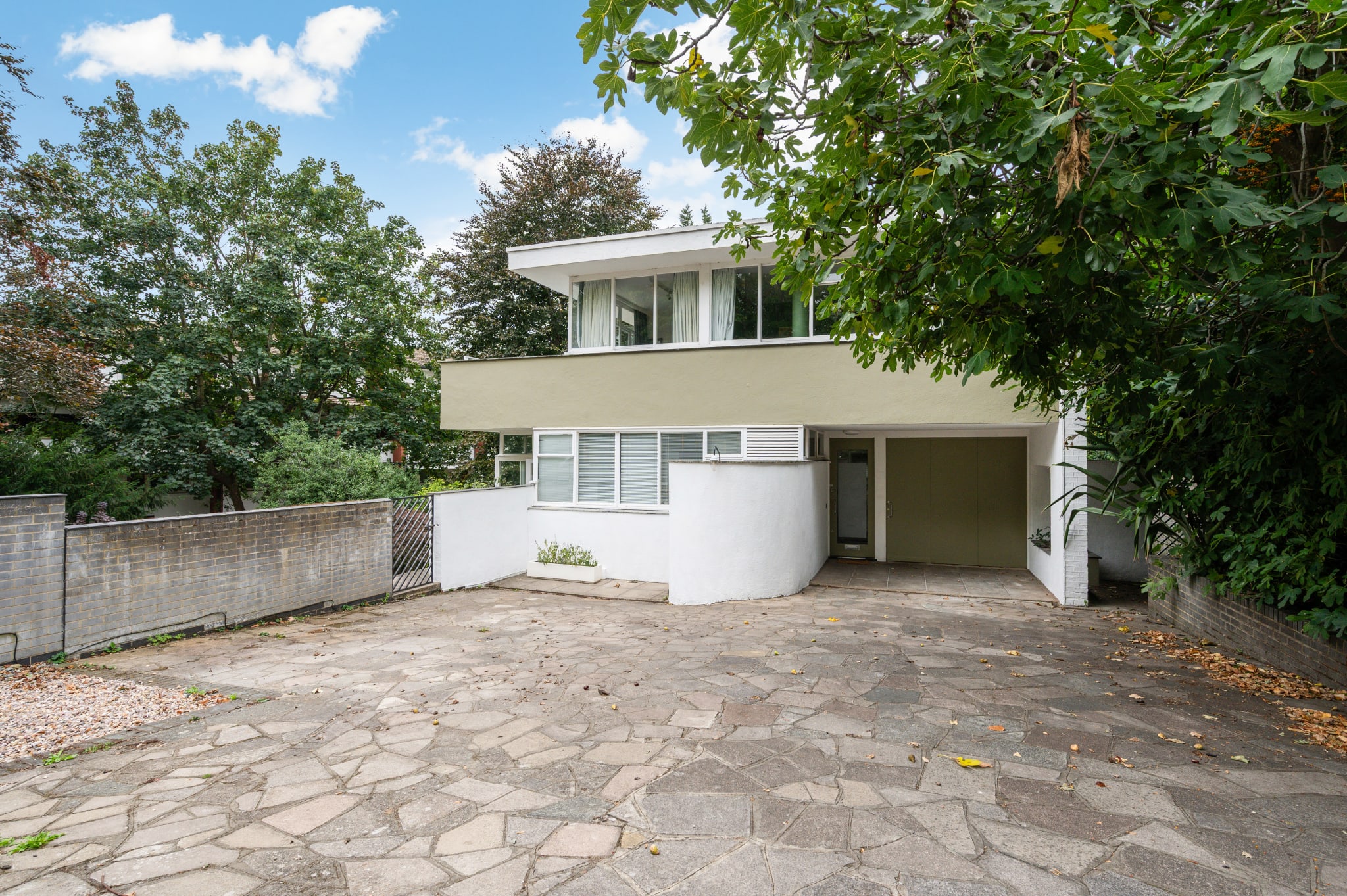 Restoring Modernist Houses: Putney Renovation Guide